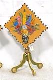 Lot 22:  MACKENZIE CHILDS "Blooming" Tilt Top Table. Floral Still Life with Courtly Check Trim. Marked. : Dimensions:  H: 24.5 inches: W: 19 inches: D: 19 inches --- 