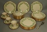 Lot 29:  LENOX Holiday Dishes China. Set includes 16 dinner plates; 11 lunch plates; 6 saucers; 2 teacups & 1 mug. One serving fork. Gold rim. : Dimensions:   --- US Shipping charge: $80