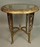 Lot 58:  Brass Decorative Side Table. Decorative floral frame with pierced legs. Inset glass top. Marked Verona; patent pending. : Dimensions:  H: 21 inches: W: 21 inches: D: 21 inches --- 