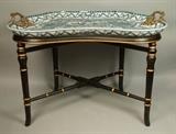 Lot 62:  Contemporary New Blue & White Pottery Tray Table. Black & Gold Painted spindle legs & frame. Asian style Tray has metal handles & is removable. from base.  Marked Castilian. : Dimensions:  H: 22 inches: W: 31 inches: D: 20.5 inches --- 