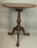 Lot 63:  Antique Pie Crust Tilt Top Tea Table. Three legged pedestal base with Ball n Claw feet. Rotates. : Dimensions:  H: 29 inches: W: 27 inches: D: 27 inches --- 