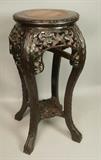 Lot 64:  Carved Asian style Wood Side Table. Stone inlaid top. Floral carved. : Dimensions:  H: 24 inches: W: 13 inches: D: 13 inches --- 