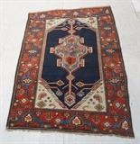 Lot 88:  6'2" x 4'1" Handmade Blue Wool Oriental Carpet Rug. Blue ground with red & cream geometric design. Red border. Uneven size. : Dimensions:   --- 
