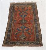 Lot 91:  6'6" x 3'9" Antique Wool Oriental Carpet Rug. Light red ground with geometric floral motif. Blue border. : Dimensions:   --- 