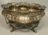 Lot 102:  Italian 800 Silver Pierced Bowl. Grotesque figural legs with swag garland elements. Marked. : Dimensions:  H: 6.75 inches: W: 12 inches: D: 12 inches --- US Shipping charge: $20