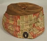 Lot 130:  Antique Continental Fabric Hat. Silver oval button with black enamel sewn to purse. Marked RZ. : Dimensions:  H: 11.5 inches: W: 7 inches --- US Shipping charge: $20