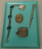 Lot 146:  5pcs Victorian and Antique Jewelry. Carved shell cameo with 800 silver frame. Hair Mourning Locket. Sterling Silver Match Safe monogrammed. Sterling brac with blue glass. : Dimensions:   --- US Shipping charge: $10