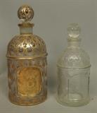 Lot 179:  2 GUERLAIN France Perfume Eau de Cologne Bottles. Raised Beehive & Bee pattern : Dimensions:  H: 7.5 inches: W: 3.25 inches --- US Shipping charge: $35