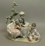 Lot 187:  LLADRO Figural Grouping. Mother with Children. African American Family. Signed. 6571. G-25E: Dimensions:  H: 11 inches: W: 11.5 inches: D: 8 inches --- US Shipping charge: $35