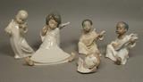 Lot 189:  5pcs LLADRO Angels Figurines Sculptures. Three African American Black Angels. One winged cherub wall hanger. One small angel figure. : Dimensions:  H: 5.75 inches: W: 6 inches: D: 6.75 inches --- US Shipping charge: $45