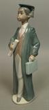 Lot 194:  LLADRO Boy Graduate Figurine Sculpture. African American Graduate. #6494.  E-28D: Dimensions:  H: 9.5 inches: W: 3.5 inches: D: 0 inches --- US Shipping charge: $35