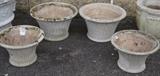 Lot 206:  4 Pcs Cement Ribbed Garden Pots GRANDON. Two different sizes. Larger pots measure 11"X18"X18"X. Smaller pots measure 9.5"X15"X15": Dimensions:  H: 11 inches: W: 18 inches: D: 18 inches --- 