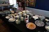 Variety of serving dishes and vases, bar stools