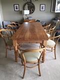 8 foot wooden table w/ 8 Thonet mid-century chairs