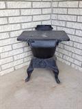 Cast cook stove.
