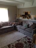 Lovely Sage Green Couch and Loveseat by Lazyboy. They do not recline or have sofa inserts.