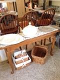 Solid wood sofa or console table flanked by 3 bar stools that swivel! Oh and some more baskets!