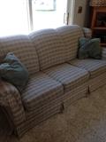 Plaid 3 cushion couch, does not recline or have a sofa bed insert.