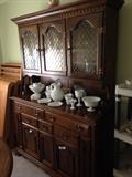 Solid wood china cabinet with some nice Milk Glass.