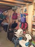 More of the basement with Life assist items, luggage and sporting goods.