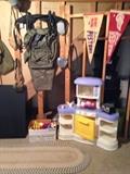 Little play kitchen and camping items.