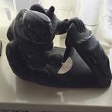 Adamie Anuata (Anautak) 1980 soapstone sculpture. 13" long, 8" tall. Signed on bottom, original gallery tags included.