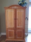 Light wood media center..... Has shelving and could be repourposed.  Great condition with lots if storage.
