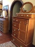 Vaughn of Virginia matching oak dresser and chest.  All drawers work well , both pieces have mirrors and stone covers on top drawers. Very sturdy pieces and in excellent condition.