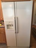 Side by side Whirlpool with ice and water on door.  Works great and is clean.