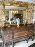 Dining Room:  The vintage sideboard has four drawers and two side doors and measures 65-l/2" wide x 37" tall x 22" deep.  The antique mirror SOLD.  Also shown are a pair of brass candlesticks and a Satsuma vase (19" tall).
