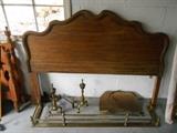 Garage:  A queen size headboard and various fireplace accessories.