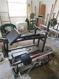 Garage:  A weight bench and a PRECISION ROWER by IMPULSE  rowing machine.