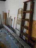 Garage:  Yard tools and ladders.