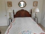Bedroom #3:  This bedroom has a three-piece vintage bedroom set but we did price it all separately:  the vintage full size bed has an ornate headboard and footboard, and a separately priced mattress set.  The colorful chenille spread is in very good condition.  The floral lamps are available but the marble top plant stands SOLD.  Floral prints and an ornate oval mirror hang on the wall behind the  bed.  