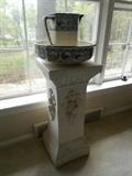 Dining Room:  A 32" tall plaster column displays a Royal Doulton blue/white bowl and a pitcher (repair needed).