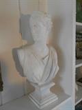 Living Room-Mantel:  A 23-l/2" tall plaster bust of Diana, the Huntress.