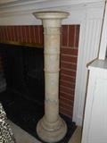 Living Room: A vintage marble column pedestal is 48" tall.  The top portion (where you can see the seam) comes off.  Great piece on which to display a bust, vase or your favorite treasure! (The bust of Diana, The Huntress, was previously displayed on it in the foyer but we had to move it to this area.) 