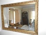 Living Room:  A gold frame mirror measures 48" wide x 33-l/2" tall.  It is actually behind the check-out as we did not have a place to which to move it.