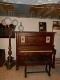 Lower Level:  A plaster electric "street light" with four globes is 77" tall.  It is to the left of a vintage player piano and bench.  