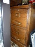 Oak file cabinet both regular size and legal size