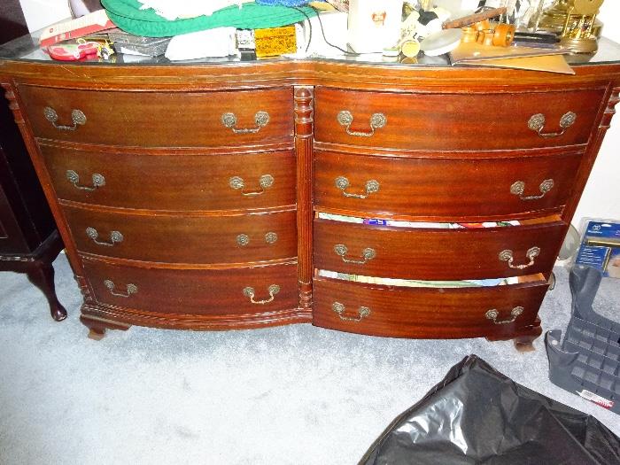 1930's dresser, chest and  bed.  Headboard has a carved picture on it. 