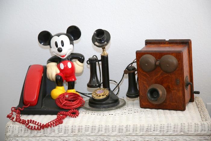 The phone on the right is sold. Mickey and the candlestick phone are still available for purchase.