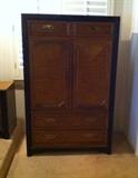 Thomasville armoire has 2 interior shelves and 4 drawers. 