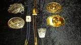 San Francisco 49ers belt buckle on the bottom right and some bolo ties
