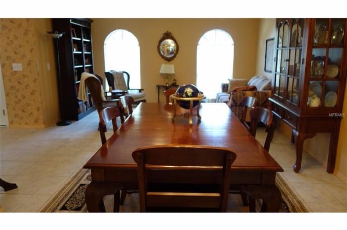 Broyhill dining room table with one leaf and 8 chairs, Broyhill china cabinet