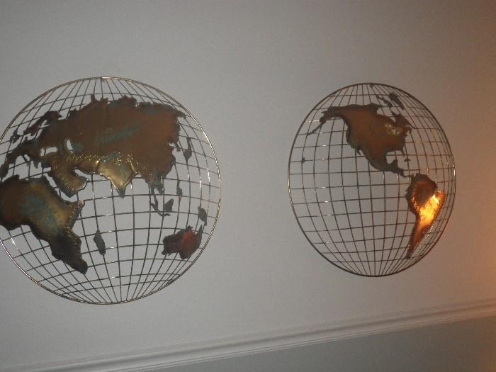 Wall decor, wire and brass globe halves.