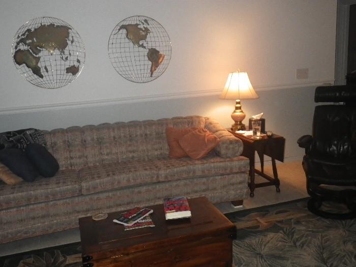 Chest, wall decor, sofa, table lamp