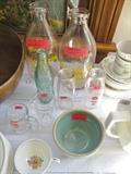 Quart milk bottles with nursery rhymes from Decatur