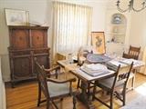 Wormy chestnut hutch, dining room table and chairs