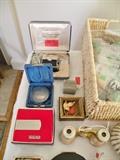 Standard transistor radio in box. 1884 agricultural medal. Sterling money clip. Antique opera glasses.